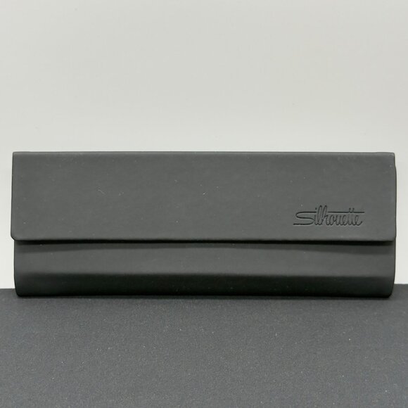 Silhouette Black Eyeglass Tri Fold Case Hard Shell Flat Lay - Picture 1 of 4